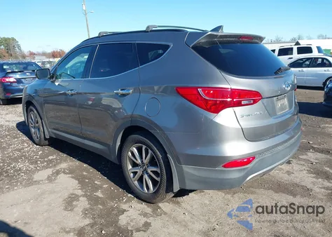 2015 Hyundai Santa Fe Sport 2.0L Turbo z USA, uszkodzony, nr VIN 5XYZUDLA2FG288632